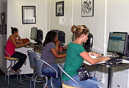 Students in Cade Library Working